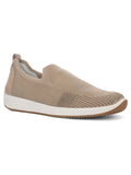 Beige sneaker with black accents on a white background