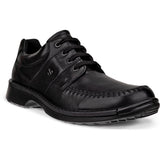 Black leather shoe on a white background