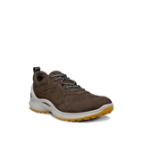 Brown sneaker with a white sole on a white background