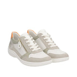 Pair of gray and white sneakers with orange accents on a white background