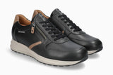 A pair of black leather sneakers with tan side accents, black laces, and a side zipper, displayed on a clean white background.
