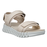 Beige sandal with white sole on a white background
