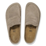 Pair of brown suede loafers on a white background