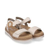 Pair of beige sandals with brown accents on a white background