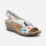 Wedge sandal with floral pattern on a white background